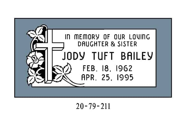 Headstone for Jody Tuft Bailey, with cross and floral design, birthdate 1962, death date 1995.