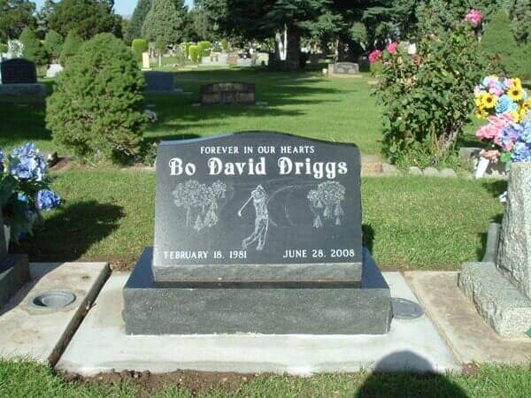 Black granite tombstone with name 