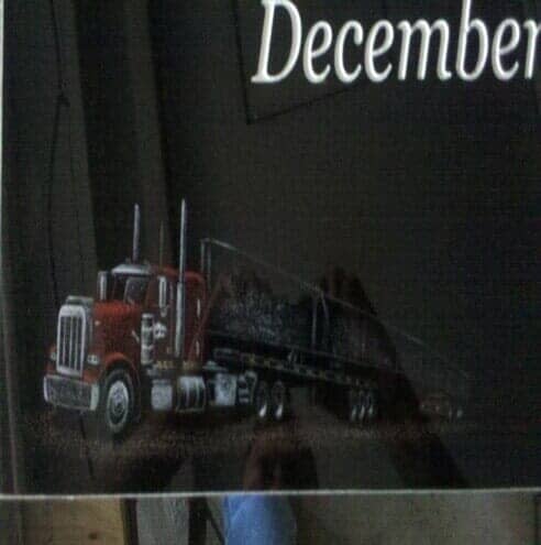 Red and black semi-truck painted on a dark background. 