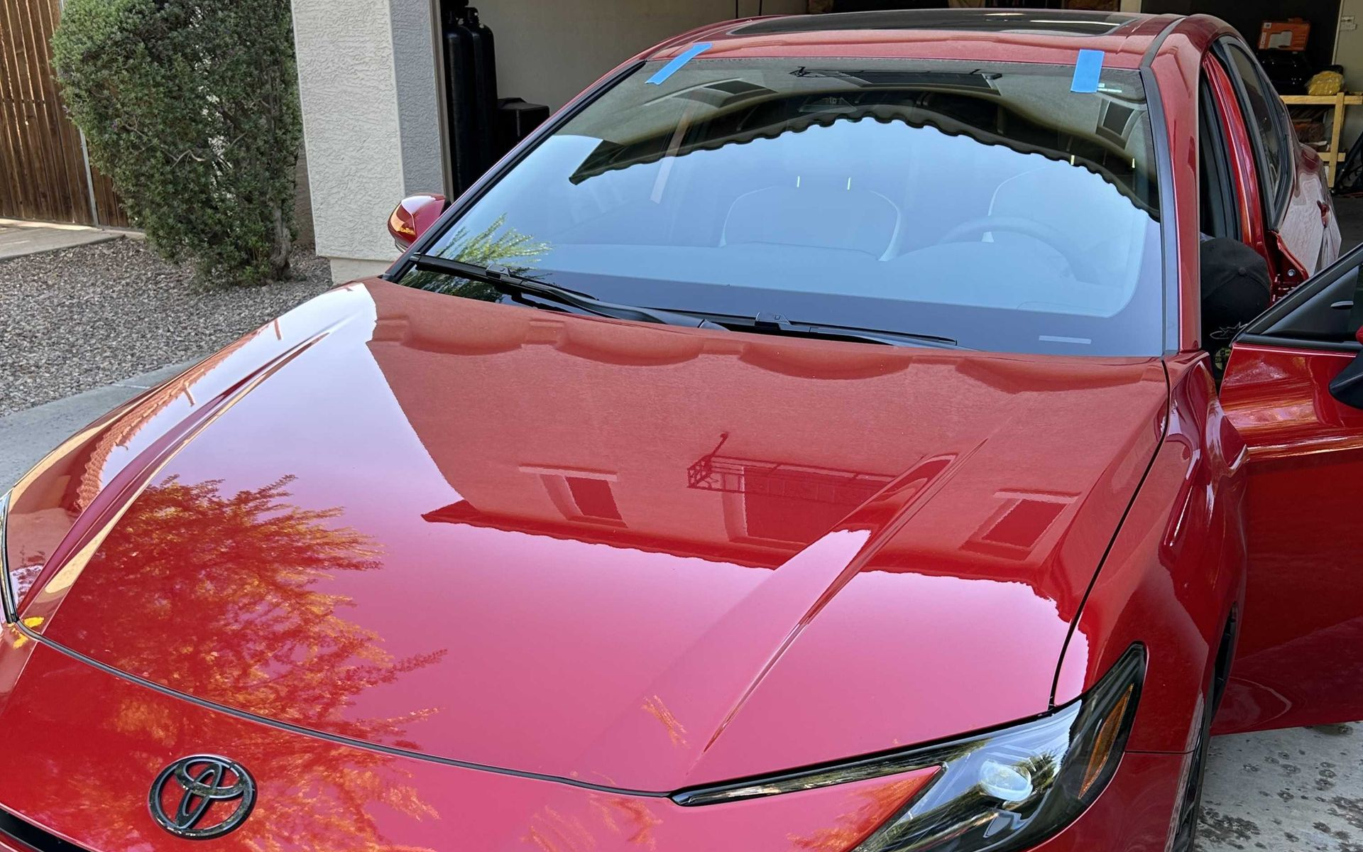 Red Toyota Camry windshield replacement in Gilbert, AZ