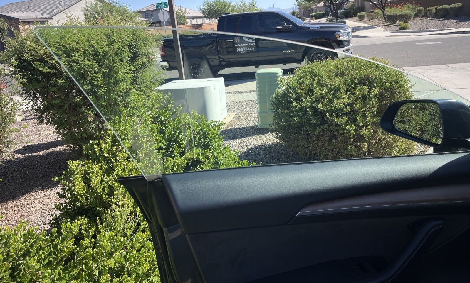 Mobile auto glass repair and replacement of door glass.