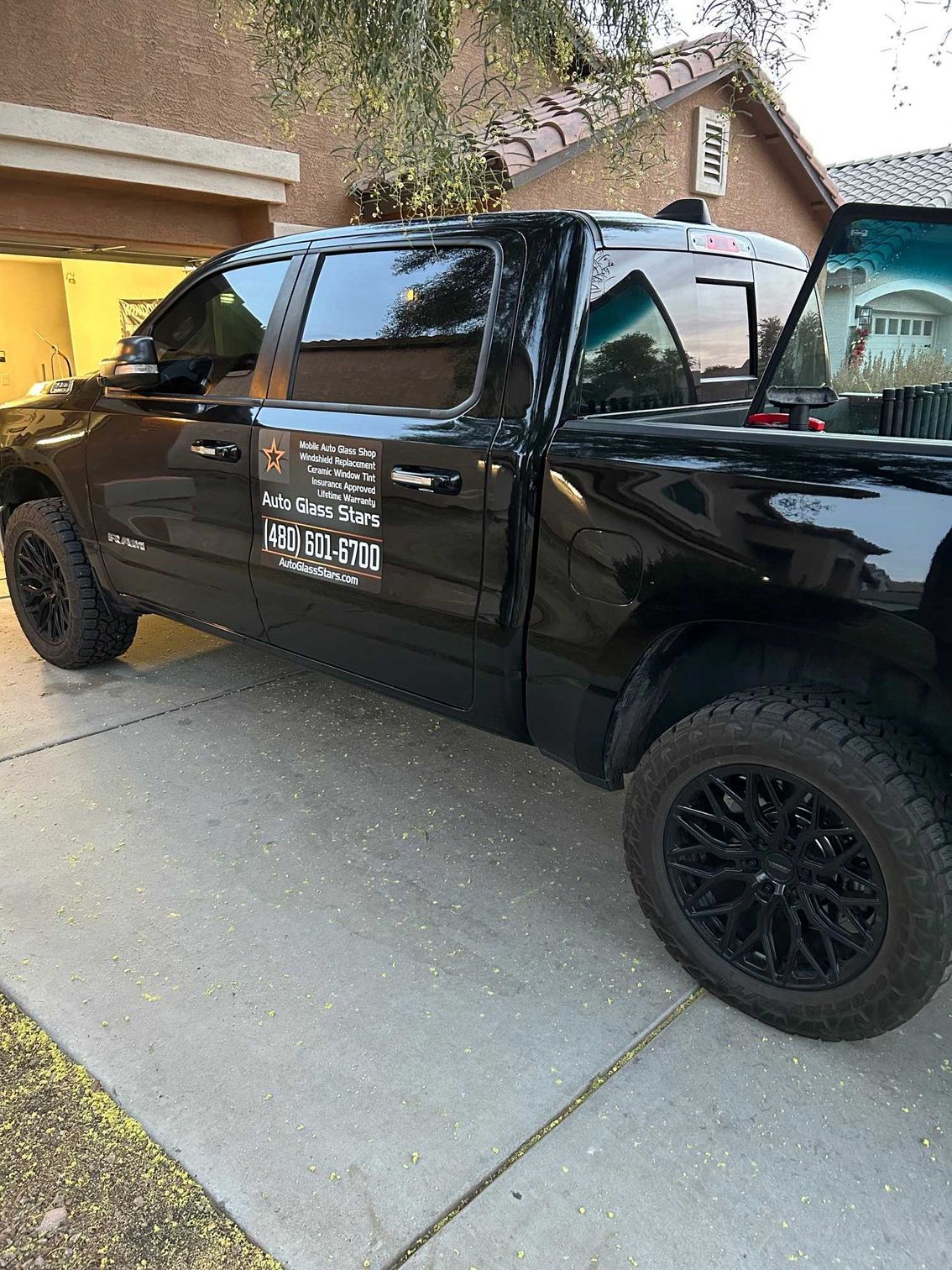 Mobile windshield replacement truck with windshields in the bed.