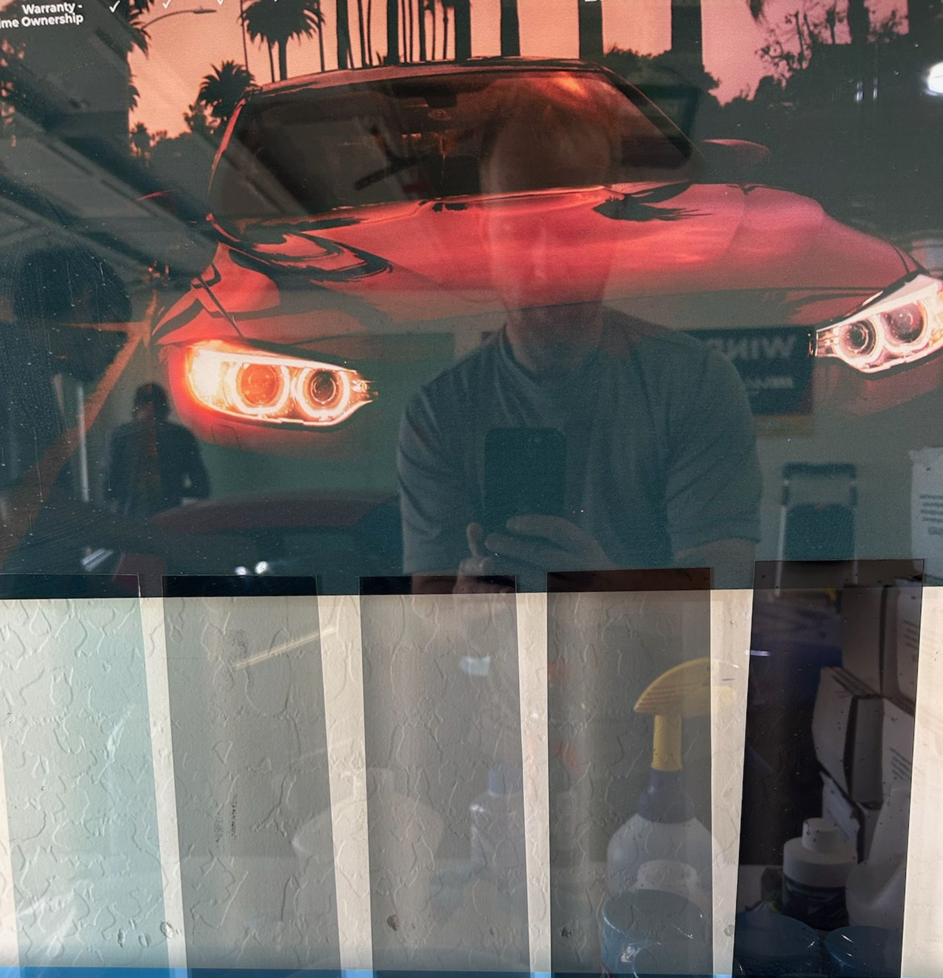 Ceramic tint shades from lighter to darker on display at a tint shop.