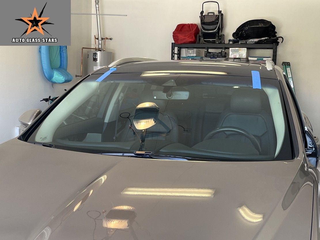 A newly replaced windshield in a garage in Queen Creek, AZ