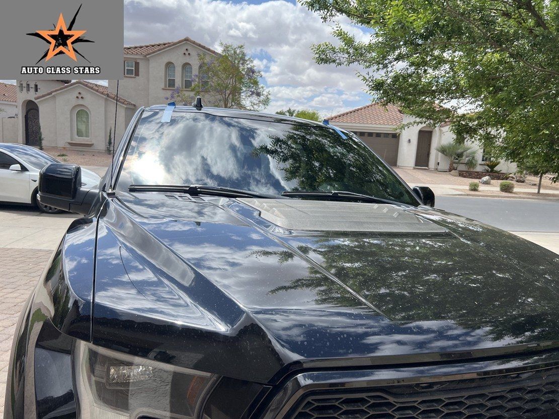 Windshield replaced on a Ford F-150 outside the customer's home.