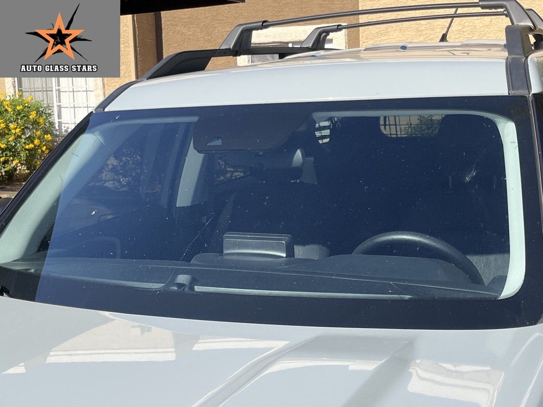 White Ford Bronco Sport windshield with a crack in Chandler, Arizona.