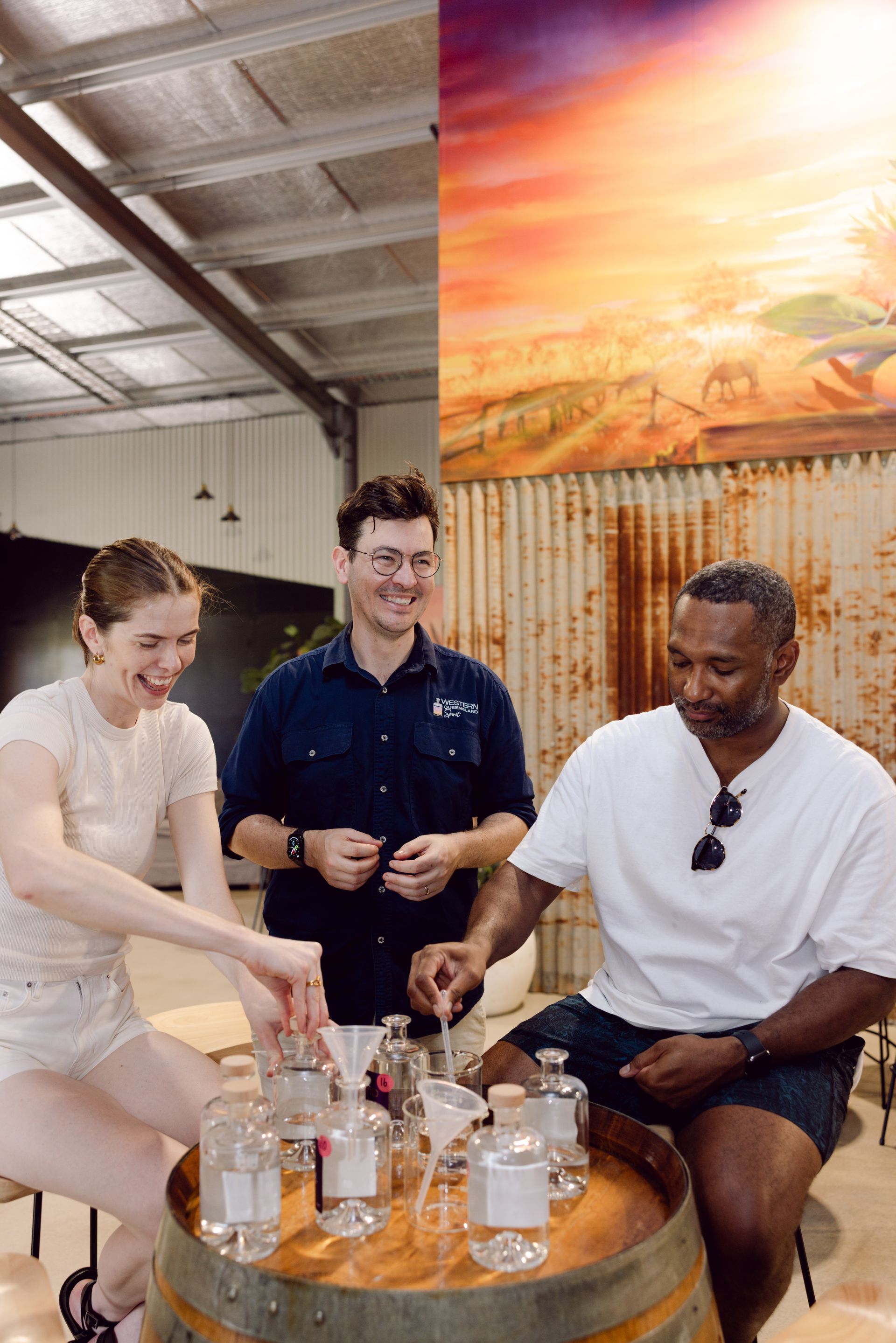 A couple is enjoying a gin blending class 