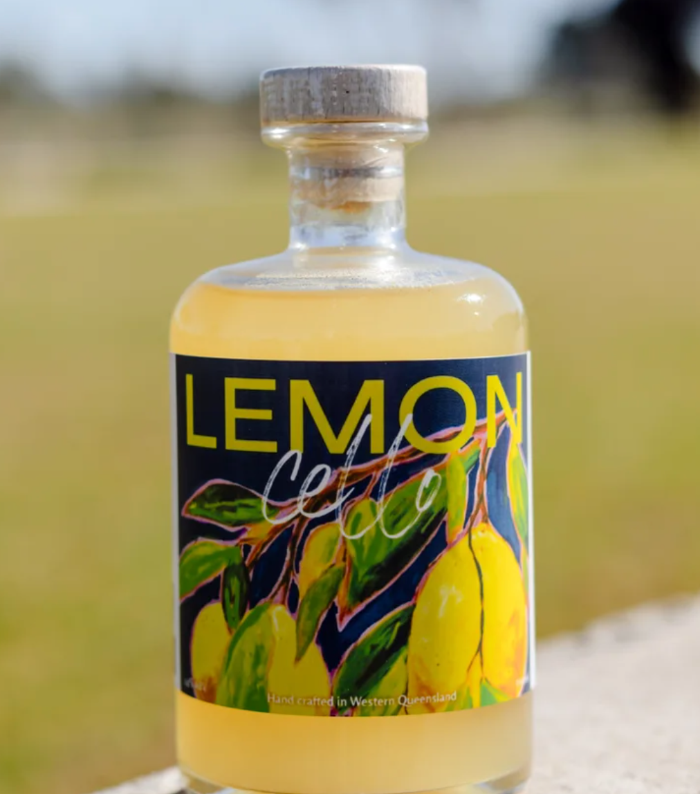 a bottle of lemon juice with a blue label