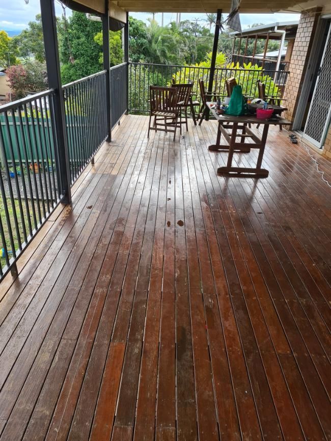 A Wooden Deck With A Table And Chairs On It — Paint & Trade Supplies Lismore In Goonellabah, NSW
