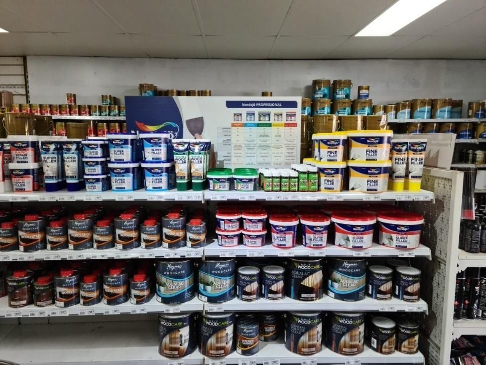 A Store Shelf Filled With Lots Of Different Types Of Paint — Paint & Trade Supplies Lismore In Goonellabah, NSW