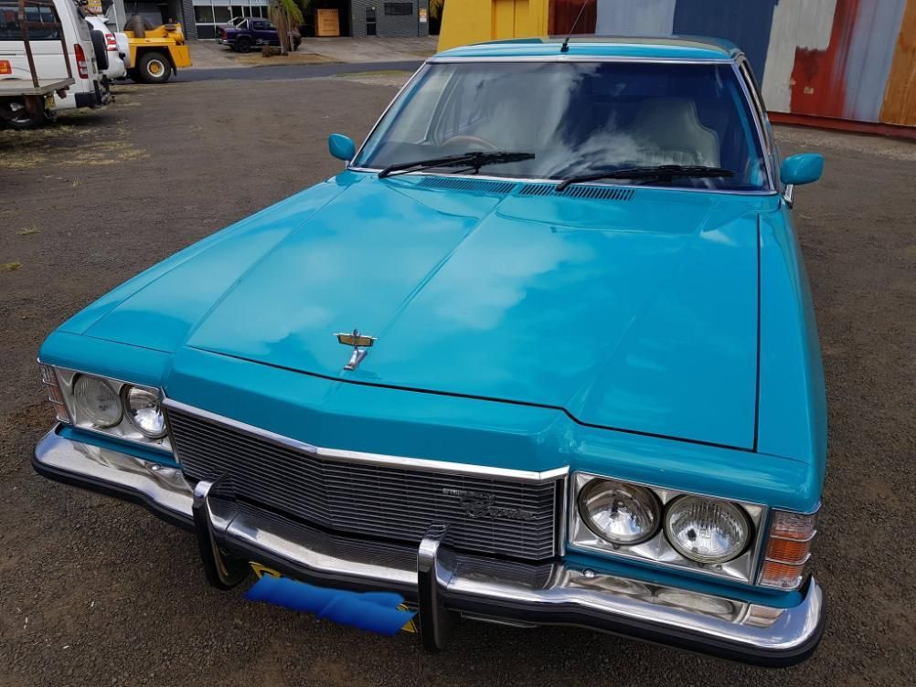 A Blue Car Is Parked In A Parking Lot — Paint & Trade Supplies Lismore In Goonellabah, NSW
