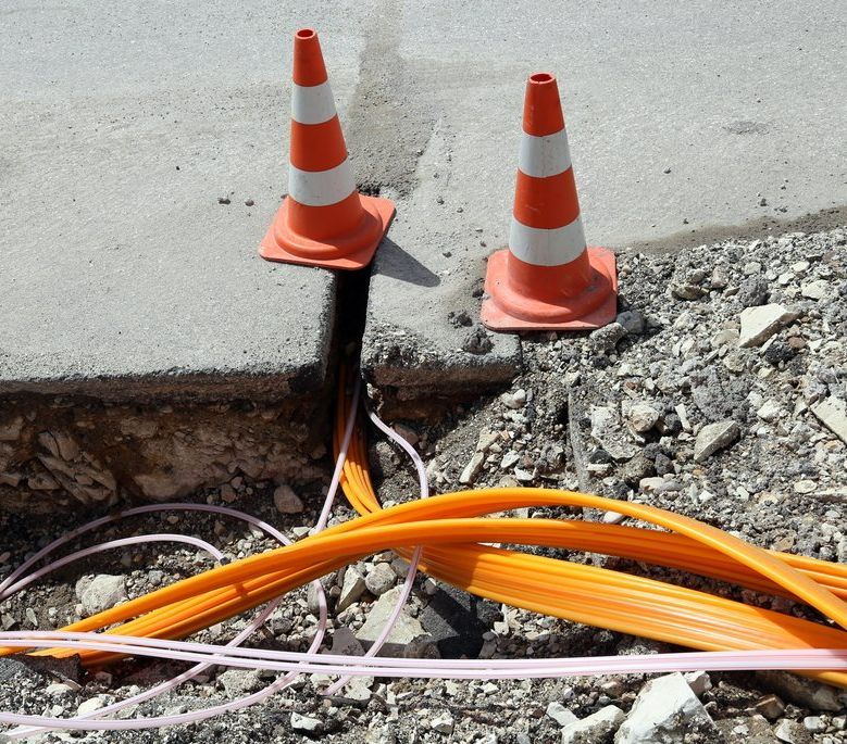 Road Construction With Pipes for Laying Optical Fiber — Hennig Electrical Services  in Nambour, QLD
