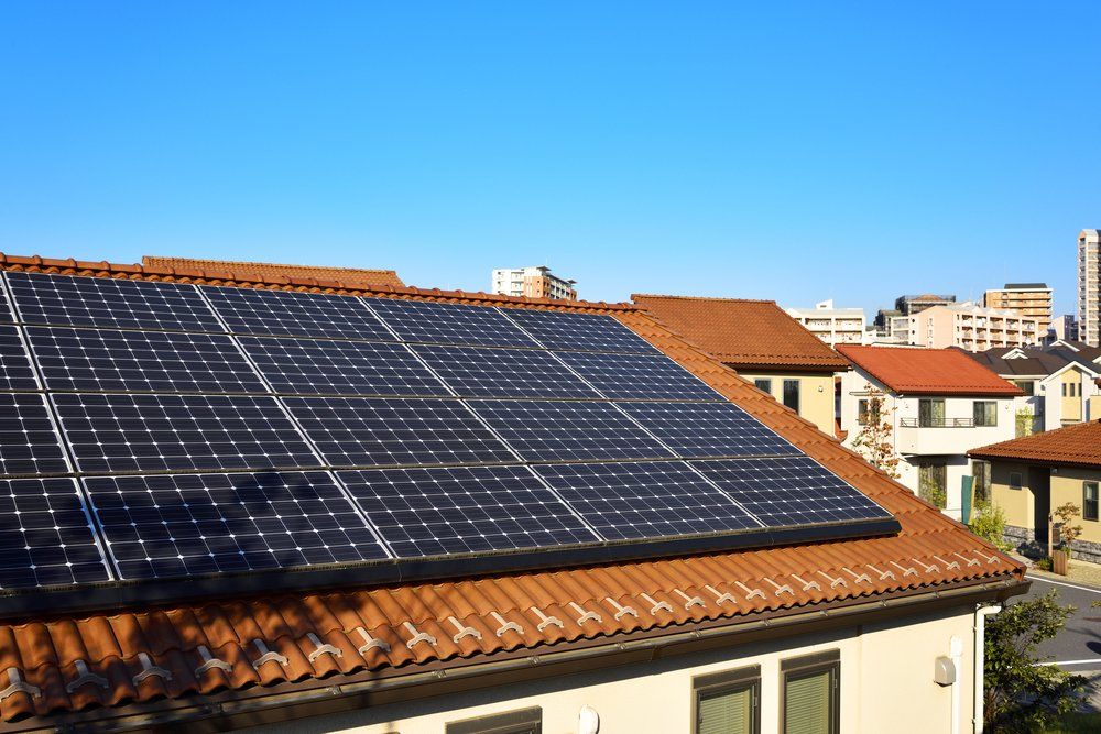 A House With Solar Panels on the Roof — Hennig Electrical Services in Noosa, QLD