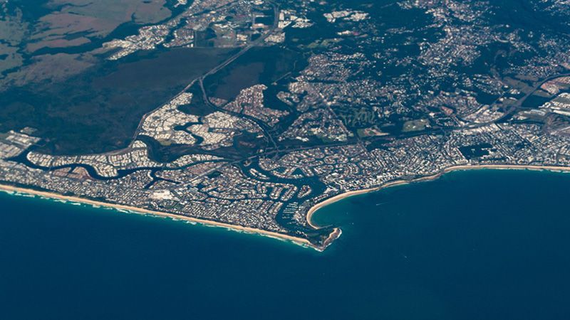 An Aerial View of a City — Hennig Electrical Services in Buddina, QLD