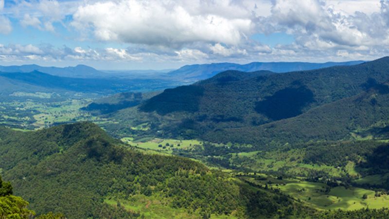 A View of a Valley Surrounded by Mountains — Hennig Electrical Services in The Range, QLD