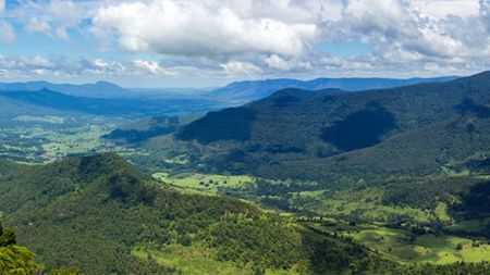 A View of a Valley Surrounded by Mountains — Hennig Electrical Services in The Range, QLD