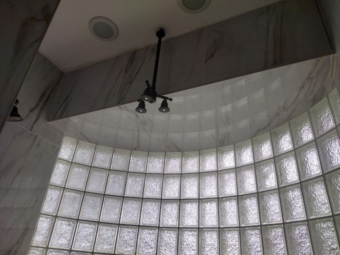 a room with a lot of glass blocks on the wall and ceiling