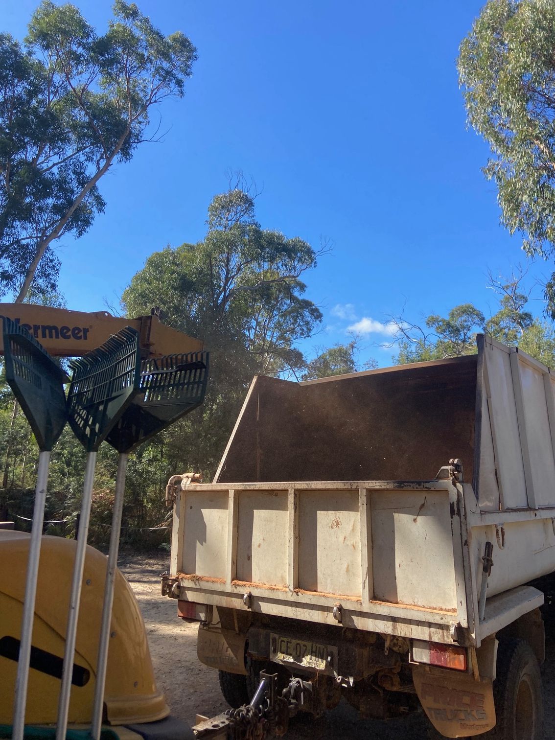 machine chipping wood to chips— Mudgee Tree Services in Eurunderee, NSW