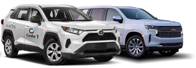 Two white SUVs: a Toyota RAV4 and a Chevrolet Tahoe, side-by-side against a white background.