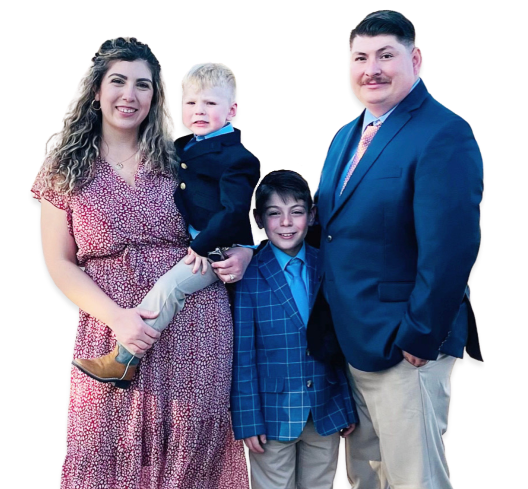 a family posing for a picture with a white background