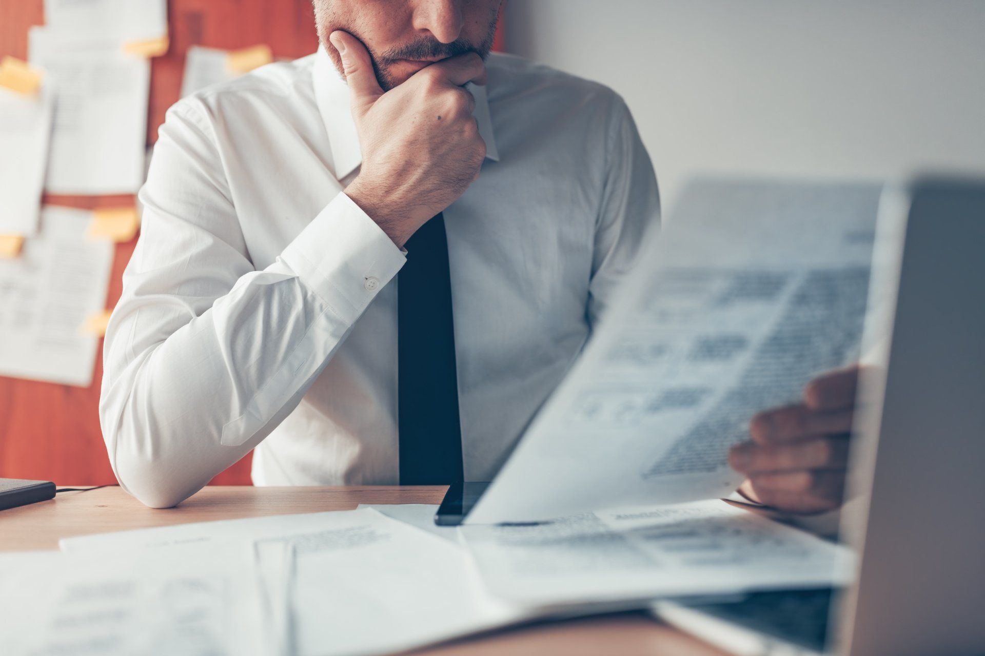 man reading document