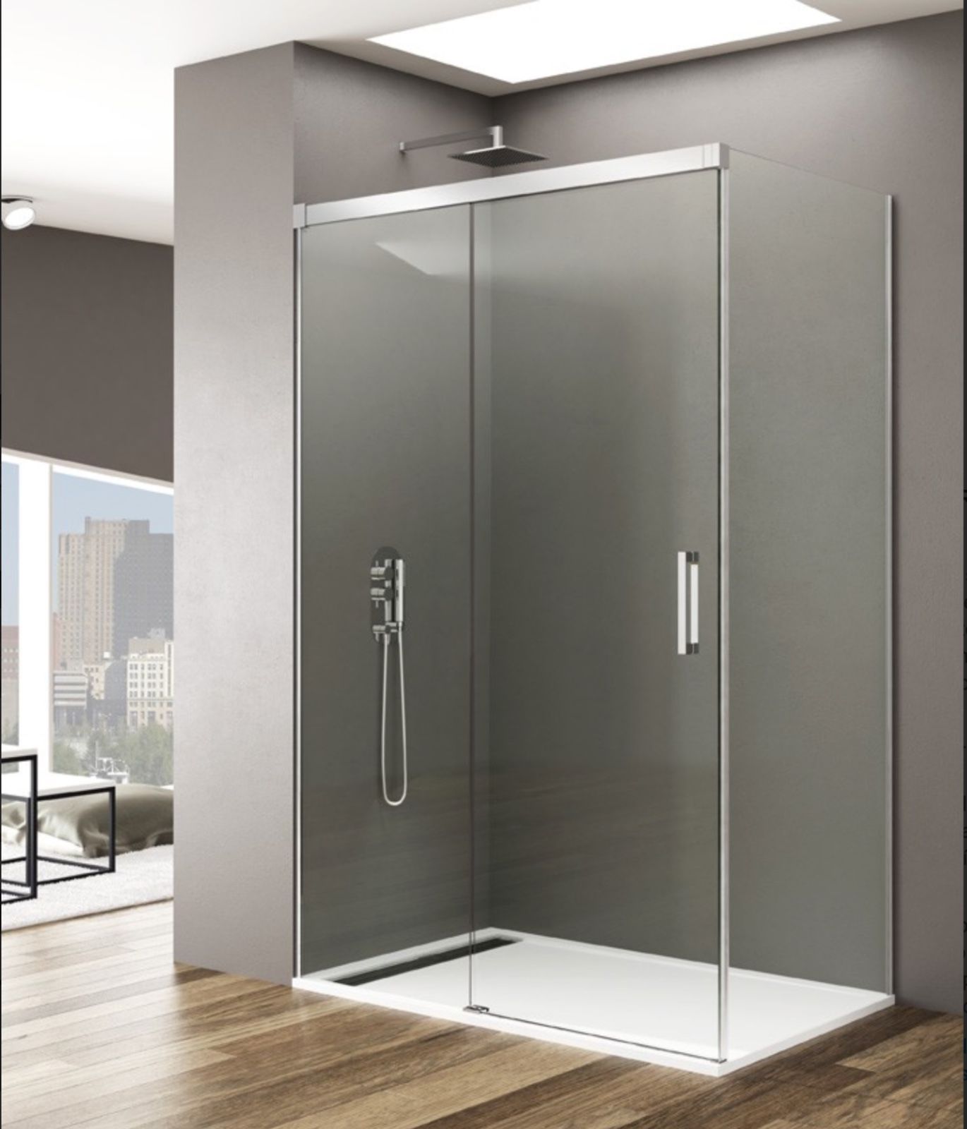 Box doccia moderno con porte scorrevoli in vetro, infissi argentati e pareti grigie.