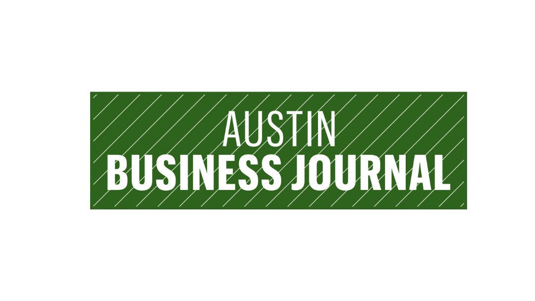 The logo for the austin business journal is green and white.