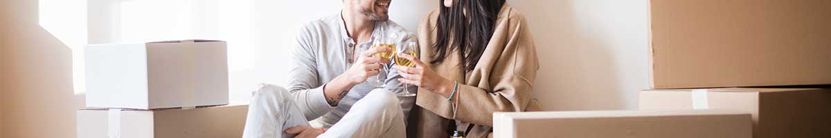 couples toast to moving in