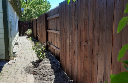 Cream-colored marble with tan and brown veining, slight granular texture.