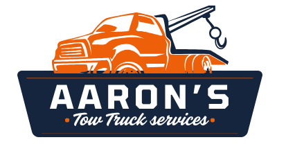 The logo for aaron 's tow truck services