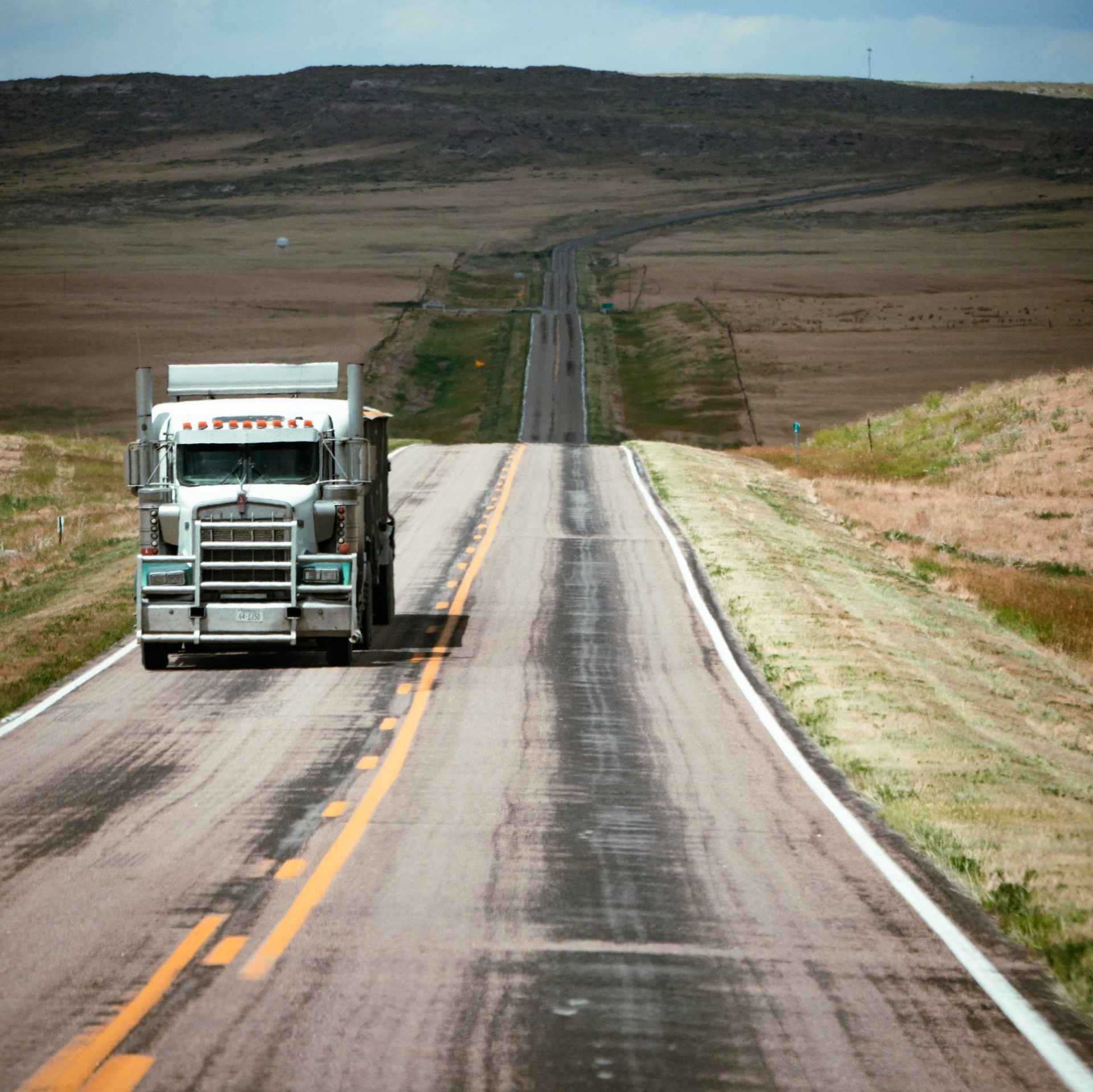 A truck driving on the road