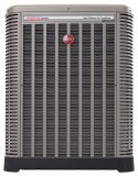 A gray air conditioner with a red ball on top of it.