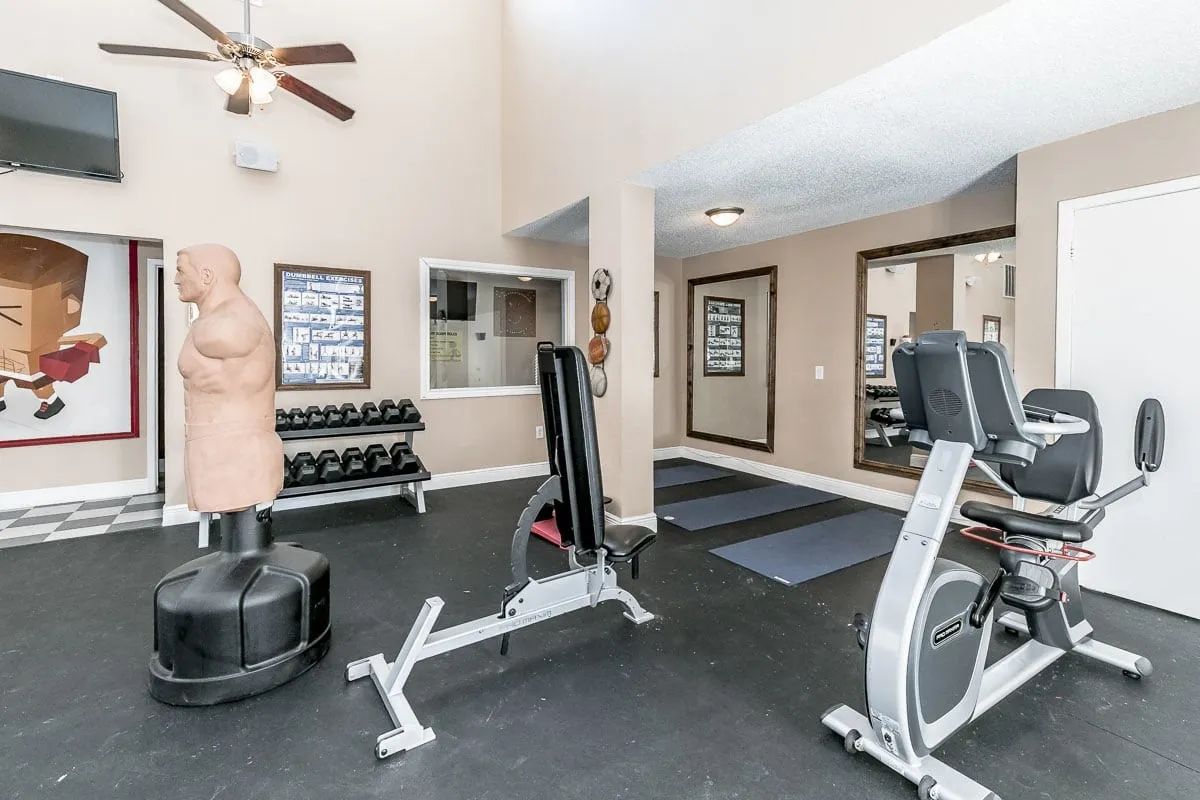 a gym with a sign that says exercise on it
