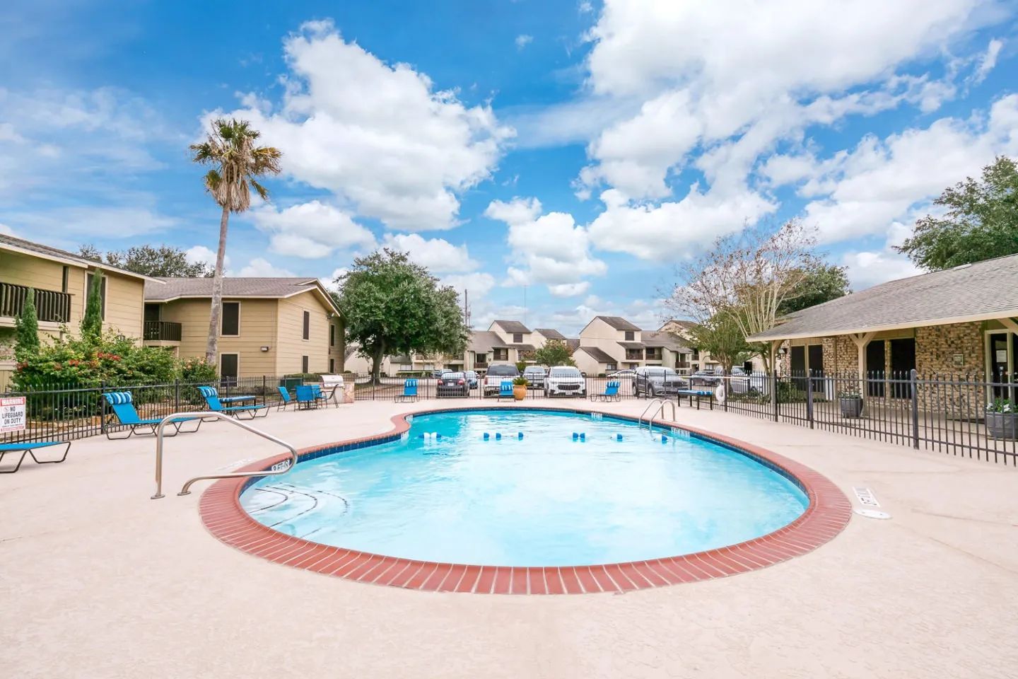 a swimming pool with a sign that says no diving
