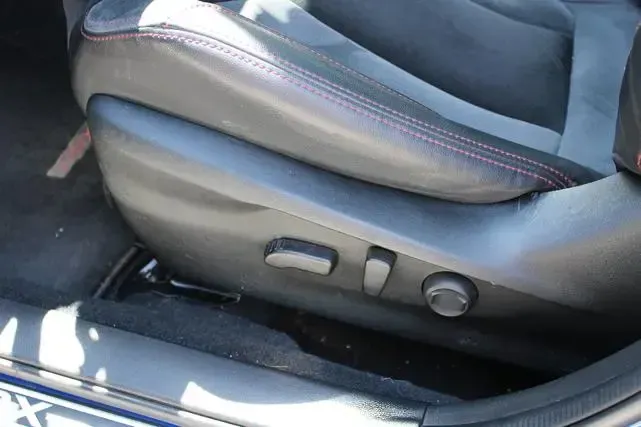 A close up of a car seat in a car.