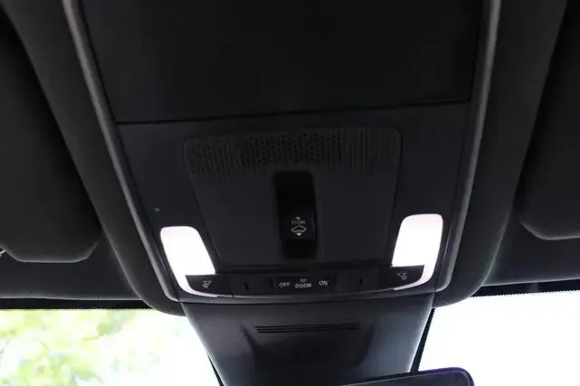 A close up of the ceiling of a car.