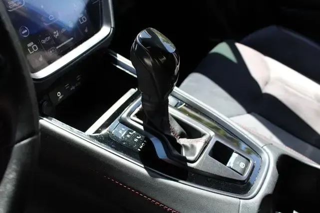 A close up of a shifter in a car