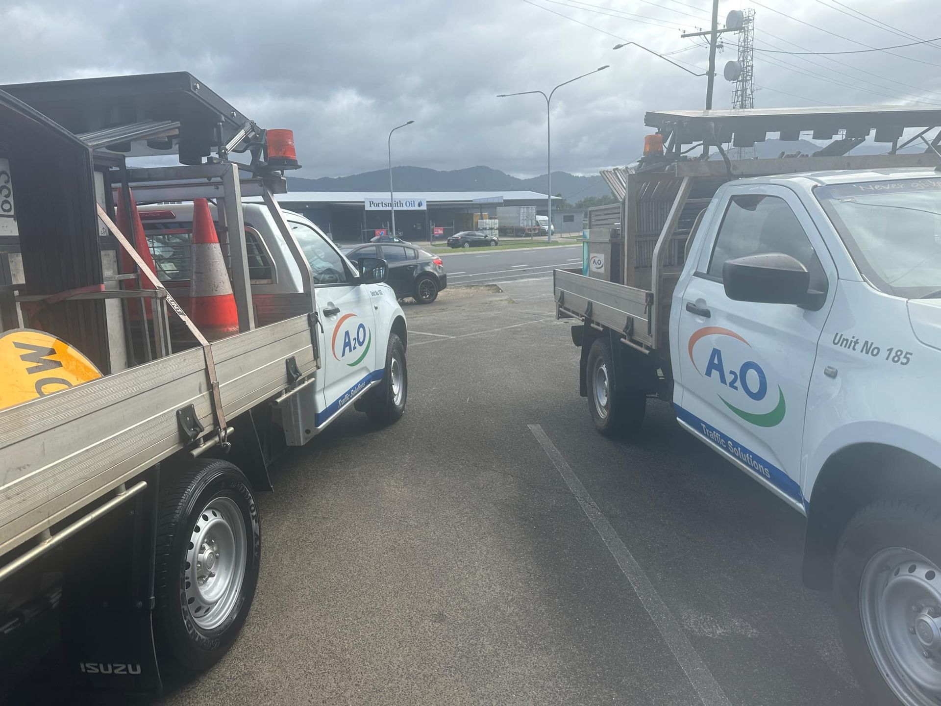 A Row of Vans Are Parked in a Parking Lot — Empire Automotive In Portsmith, QLD