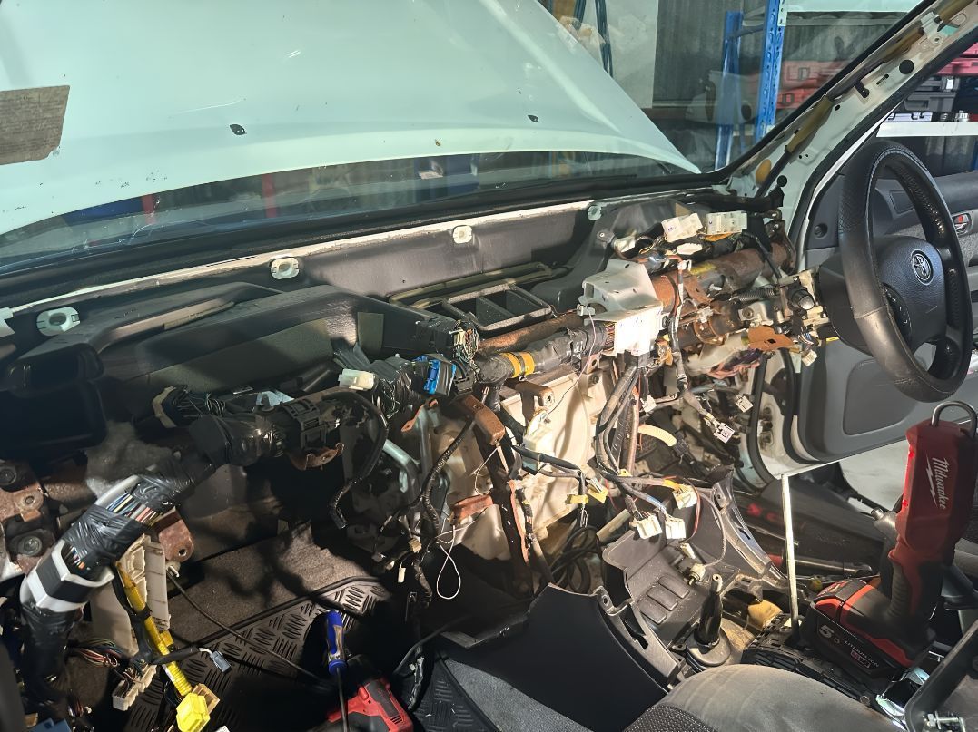 The Inside of a Car is Being Dismantled in a Garage — Empire Automotive In Portsmith, QLD