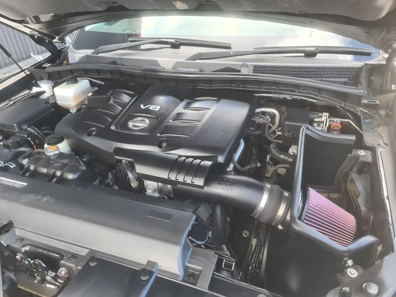 A Close Up of the Engine of a Car With the Hood Open — Empire Automotive In Portsmith, QLD