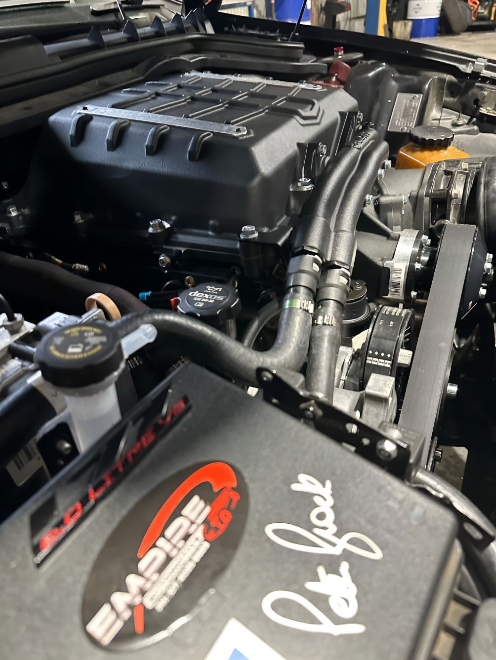 A Close Up of a Car Engine With the Word Empire on It — Empire Automotive In Portsmith, QLD