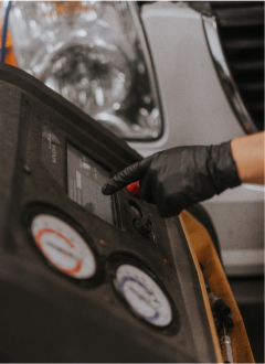 Up close of technician examining | Andrew's Automotive Repair