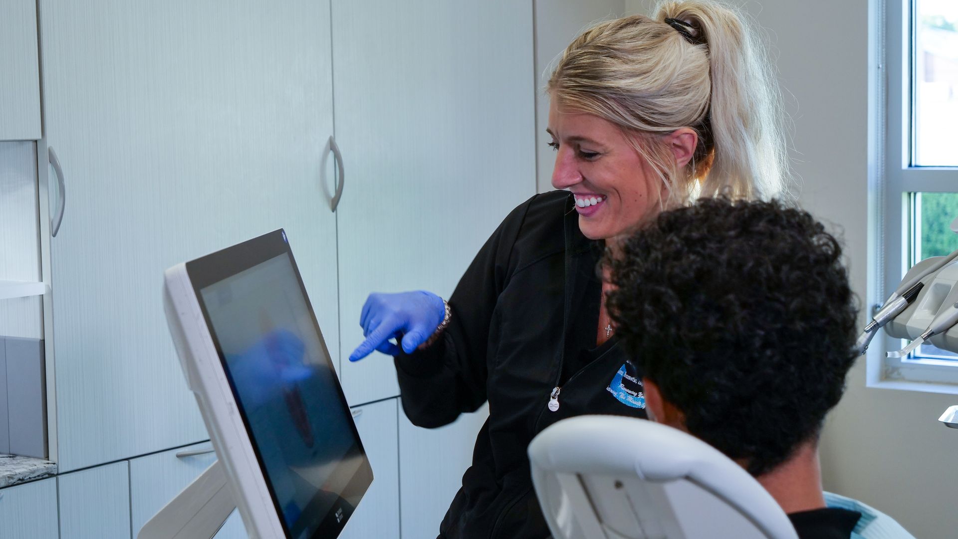 Dental hygienist smiling.