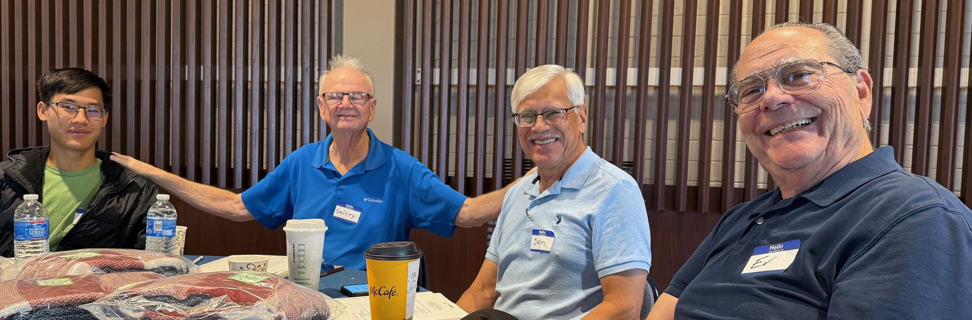Smitty and Sam (pictured in center) key volunteers at College Ave Church