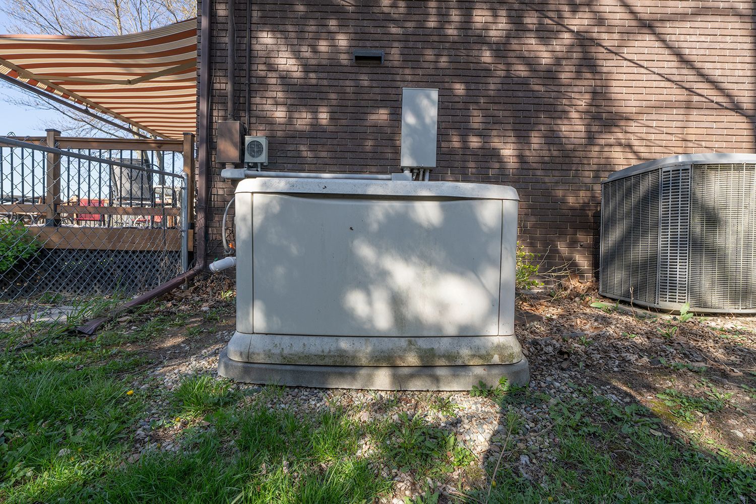 A residential generator installed. A residential generator installed.