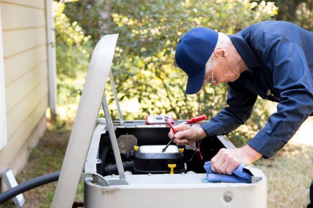 An experienced technician working on professional electric generator repair