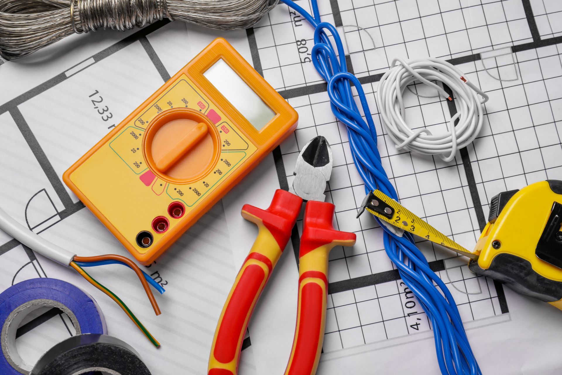 Electrical diagrams with tools and cables, representing generator repair services efficiently.
