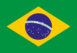 Bandera brasileña con campo verde, diamante amarillo y globo azul con estrellas y pancarta.