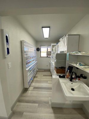 There is a sink in the middle of the room.