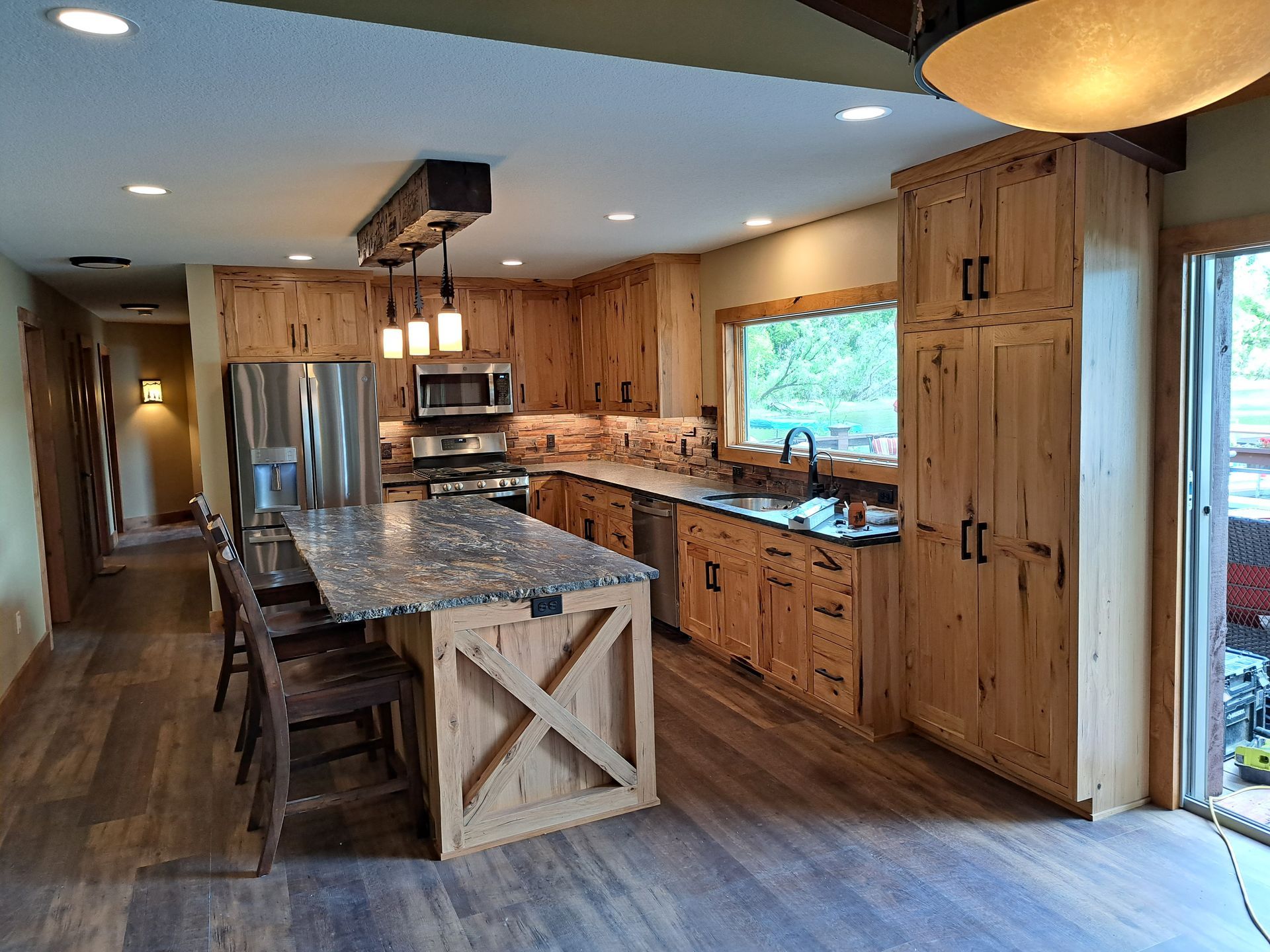 Beautifully designed custom kitchen cabinets created by Olson Cabinets & Woodworking, serving Victoria, MN.